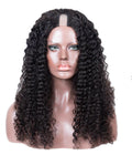 Mannequin head with a black curly human hair wig on a white background