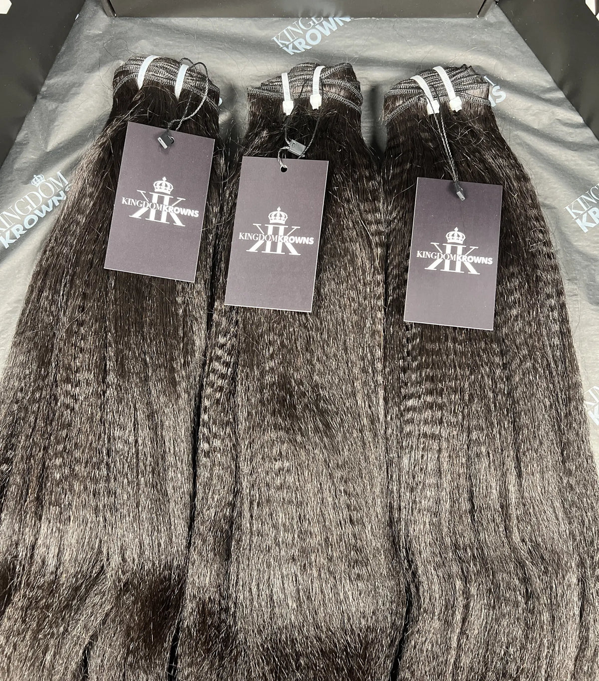 Product detail of natural black human hair bundles sold in a three-bundle deal