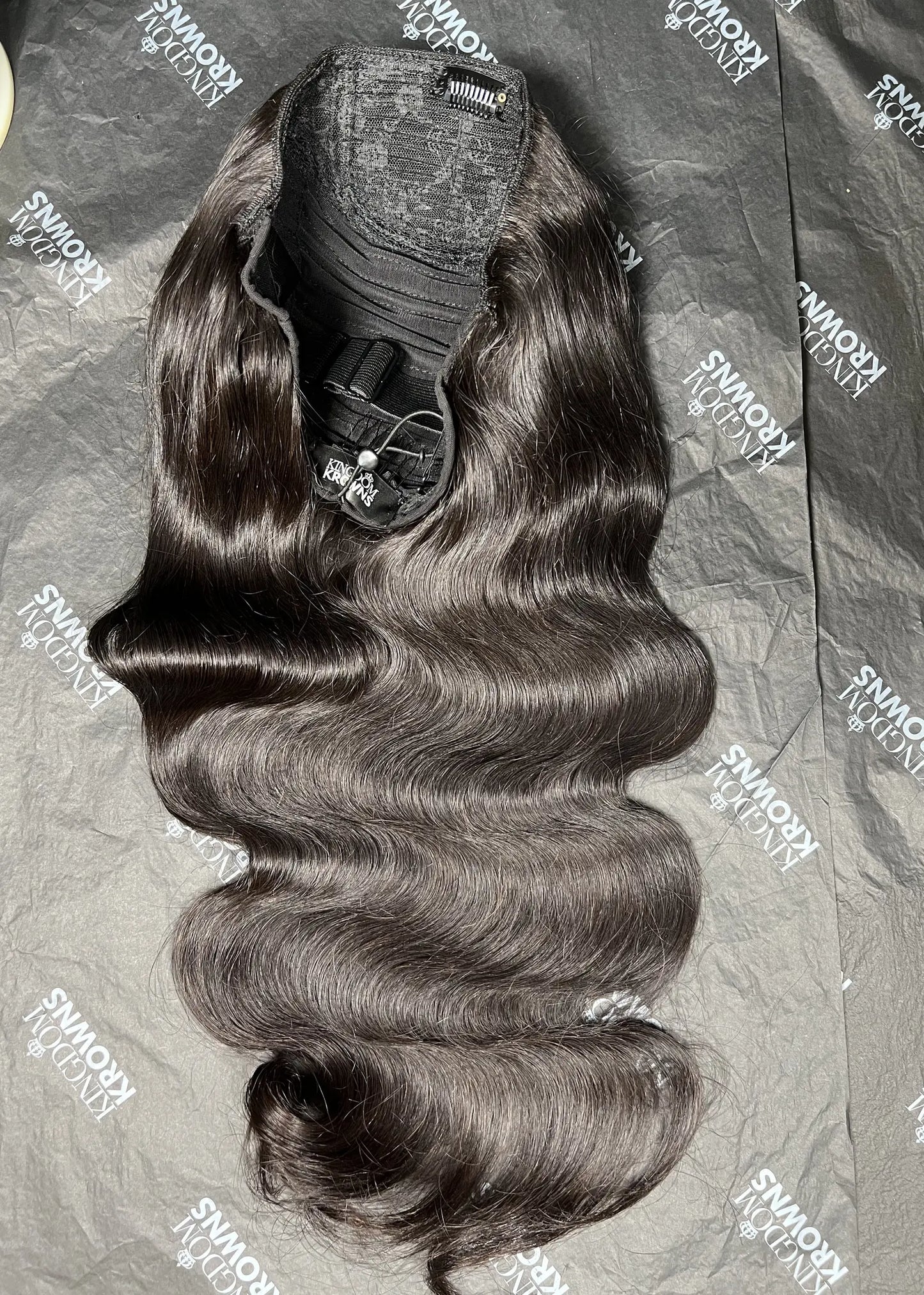 Hair extensions on a branded surface