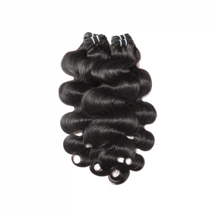 Black human hair extensions with loose curls on a white background