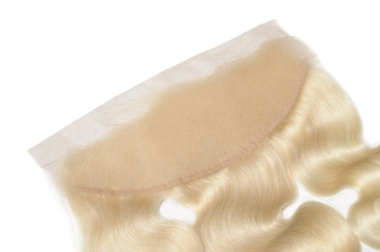 613 blonde virgin human hair HD lace frontal and closure on a white background